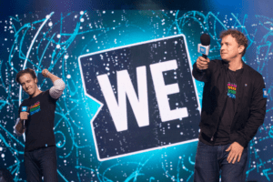 Craig & Marc Kielburger on stag at WE day